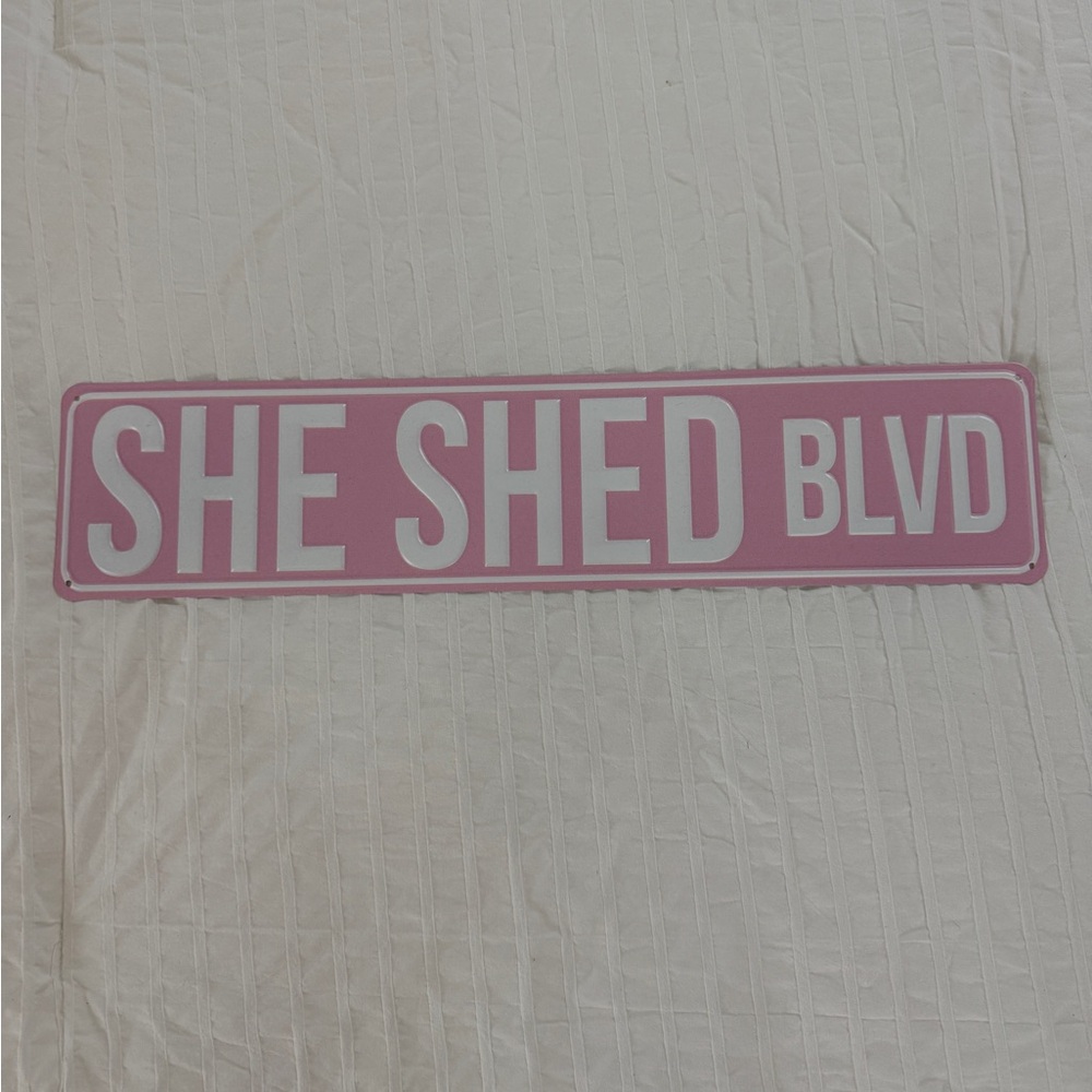 Pink 'She Shed Blvd' Sign